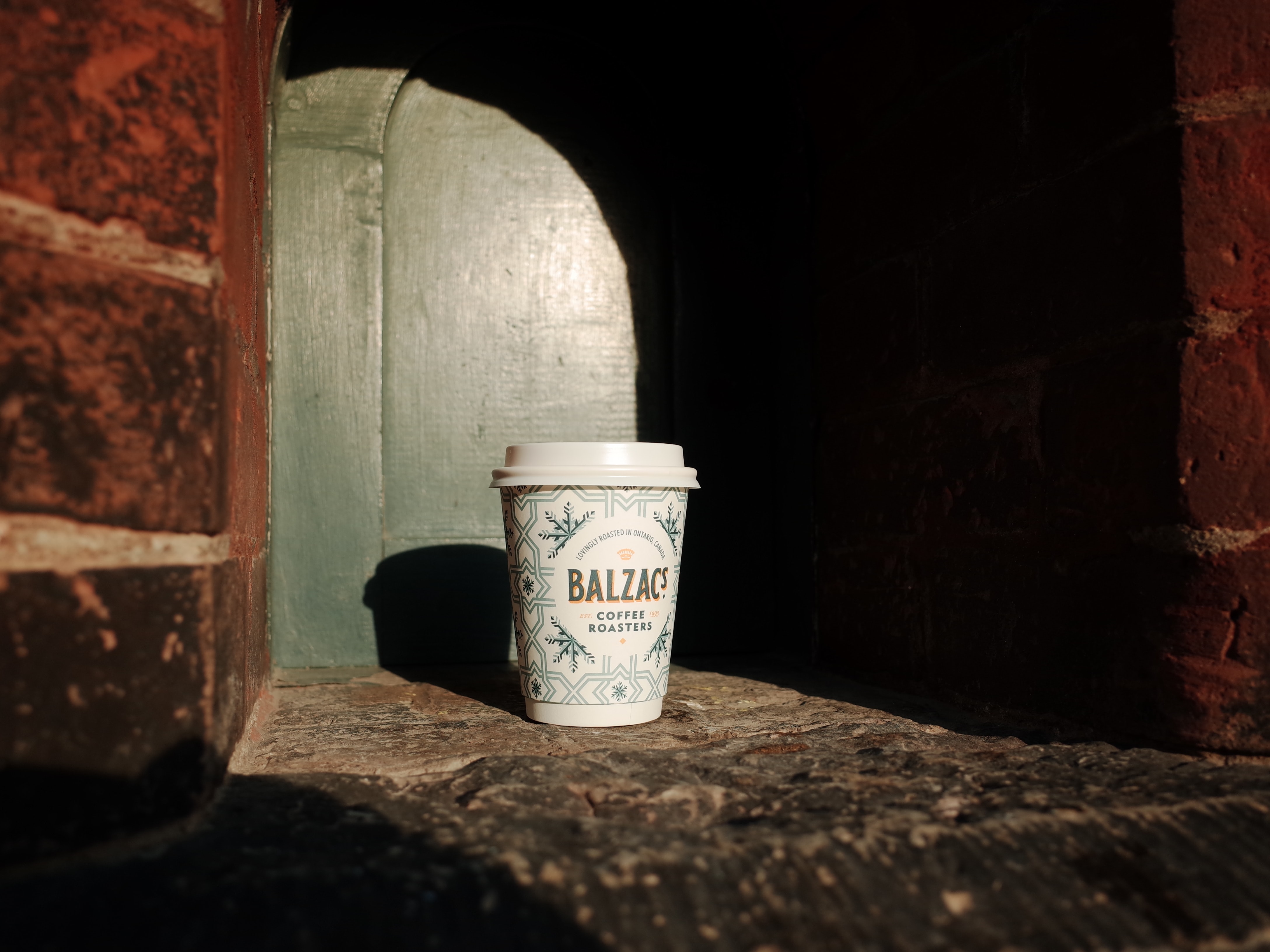 Close up of Balzac's coffee takeaway cup