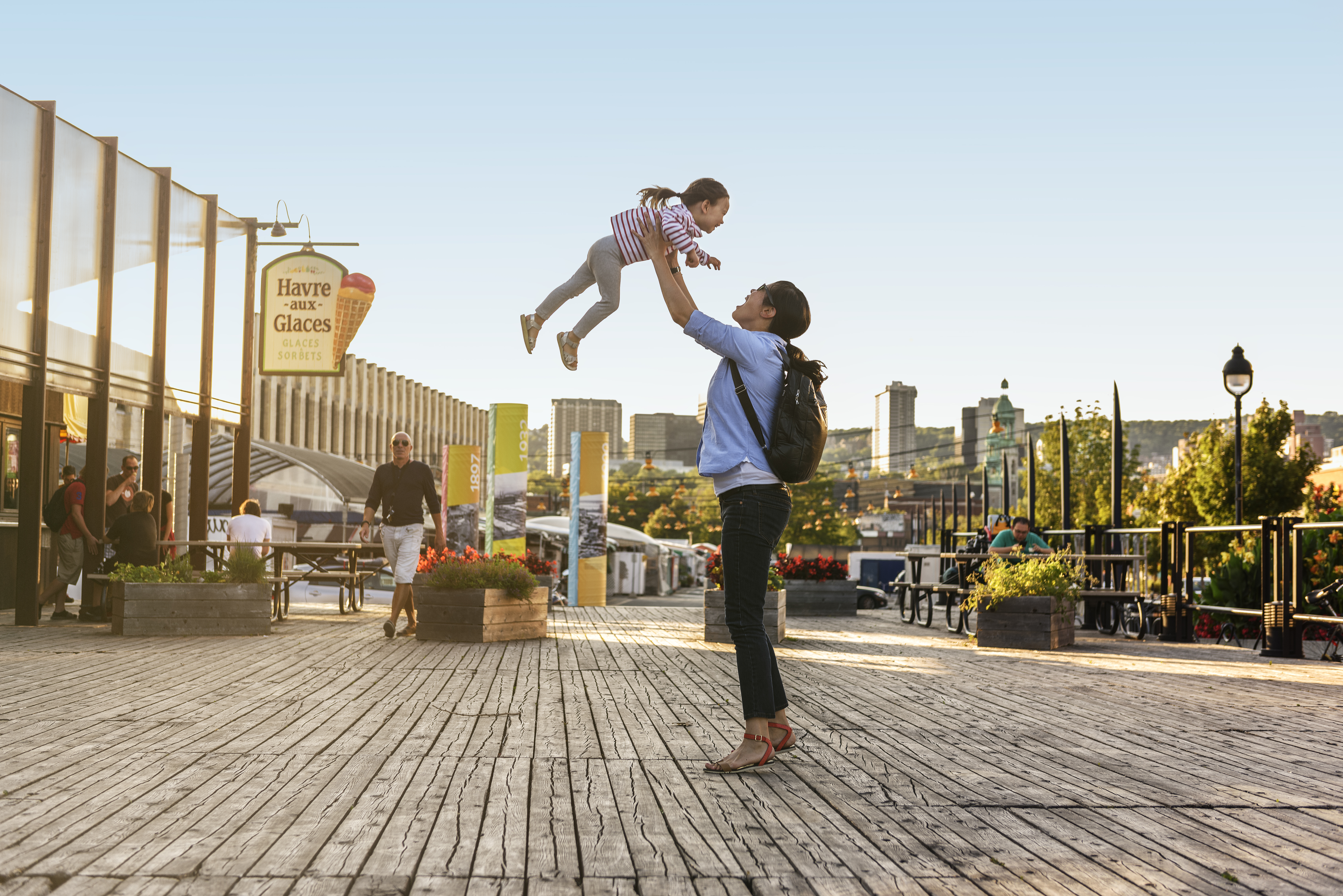 Family playing outside the Atwater Market in Montreal