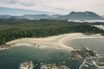 Aerial of ocean, coastline, beach, and forests in Clayoquot Sound.