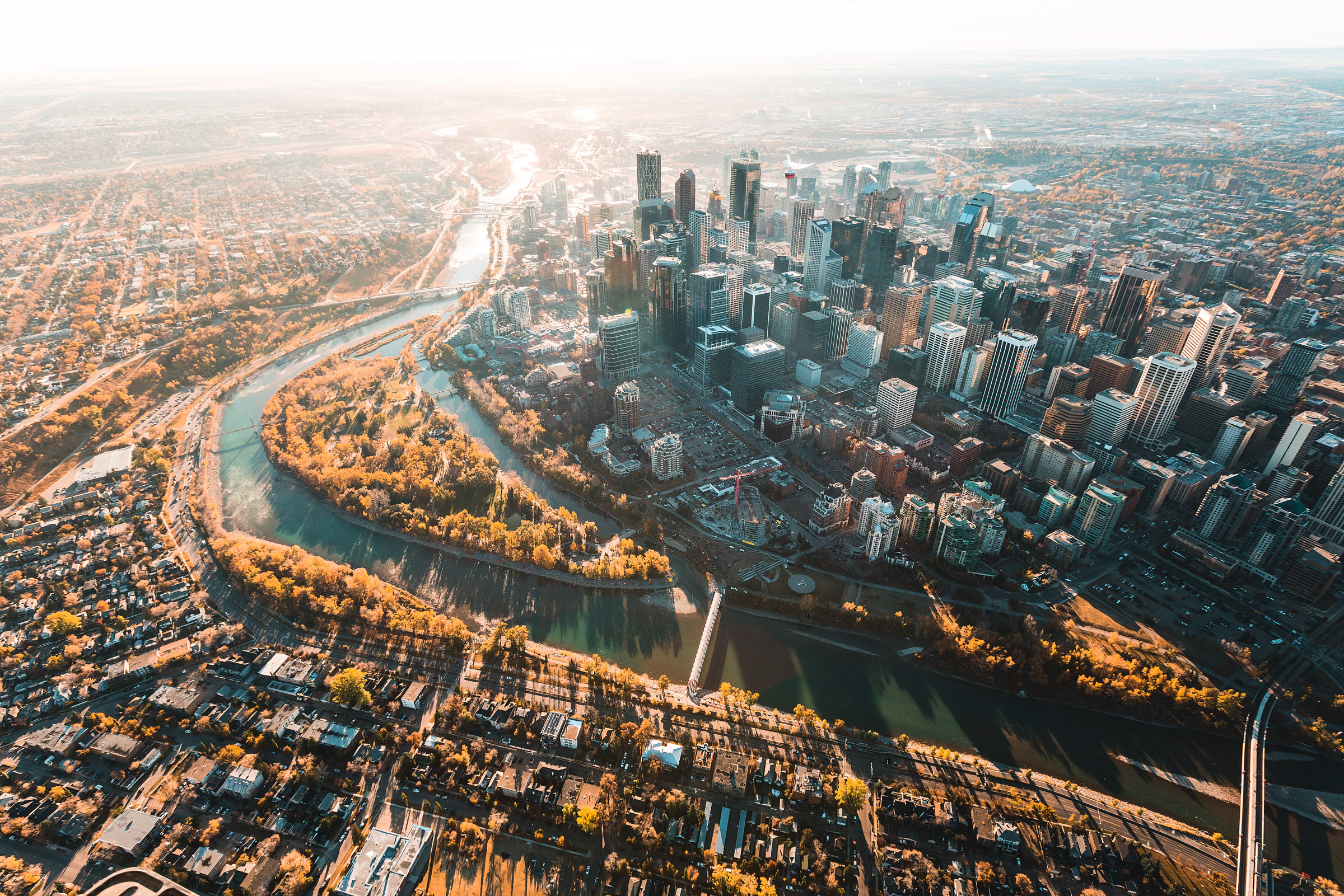 Aerial shot of downtown Calgary and Bow River in the fall