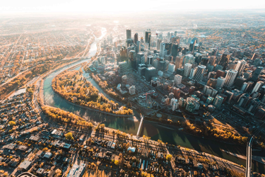 Aerial shot of downtown Calgary and Bow River in the fall