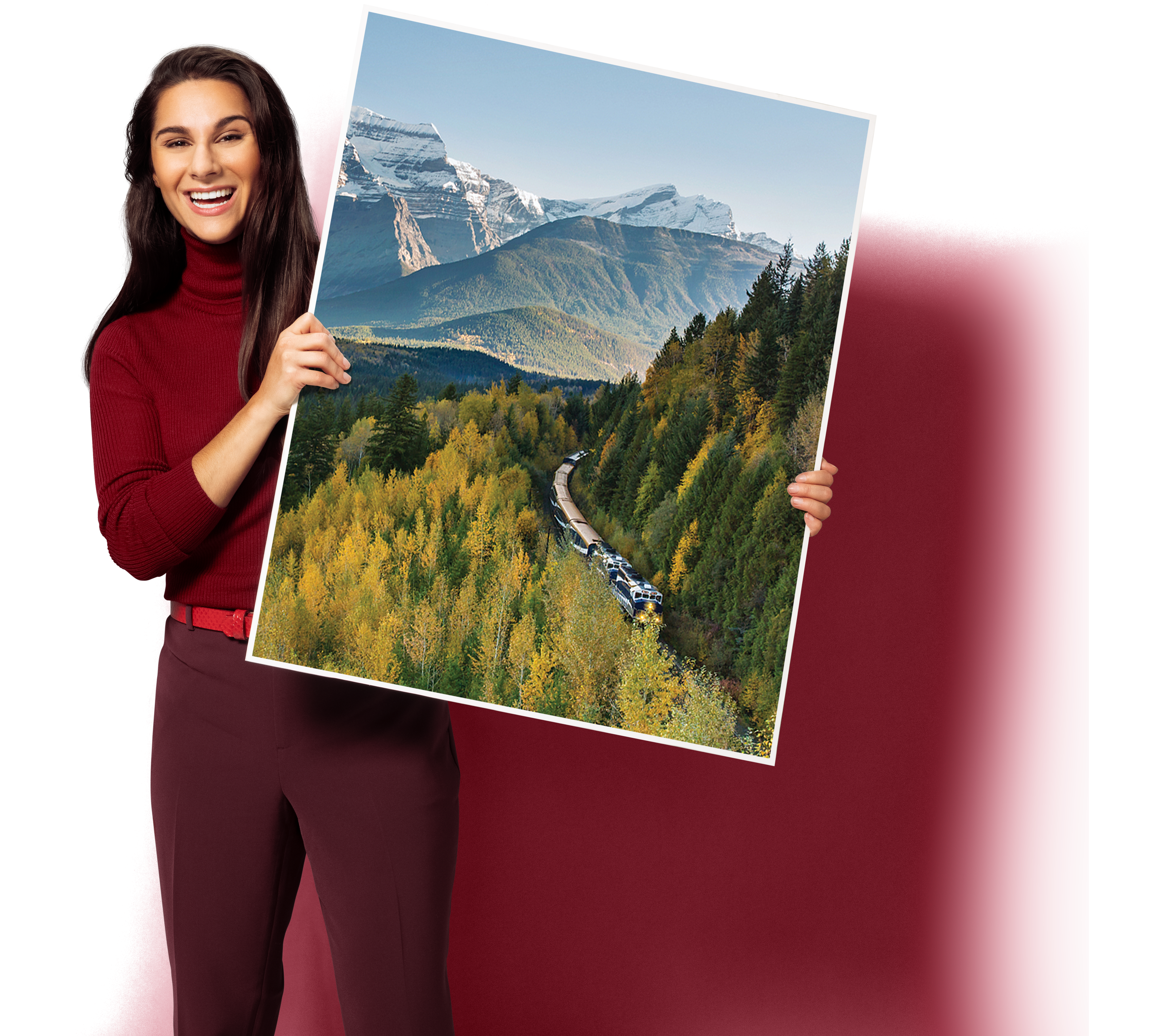 A person holding a large sign board with Canadian scenery on it