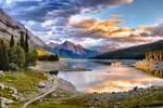 View of Medicine Lake surrounded by mountains in Jasper National Park