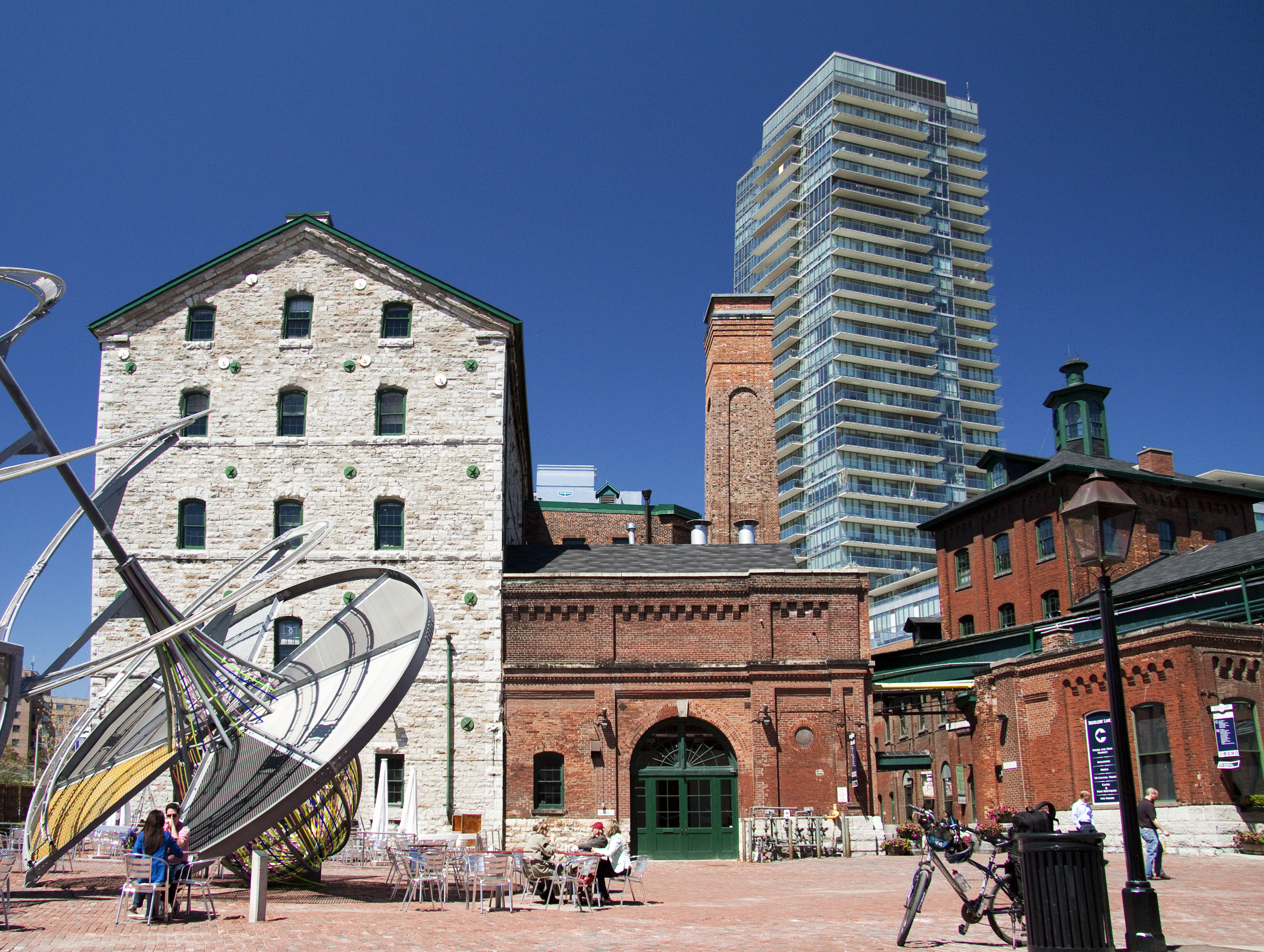 View of red brick buildings in a public square