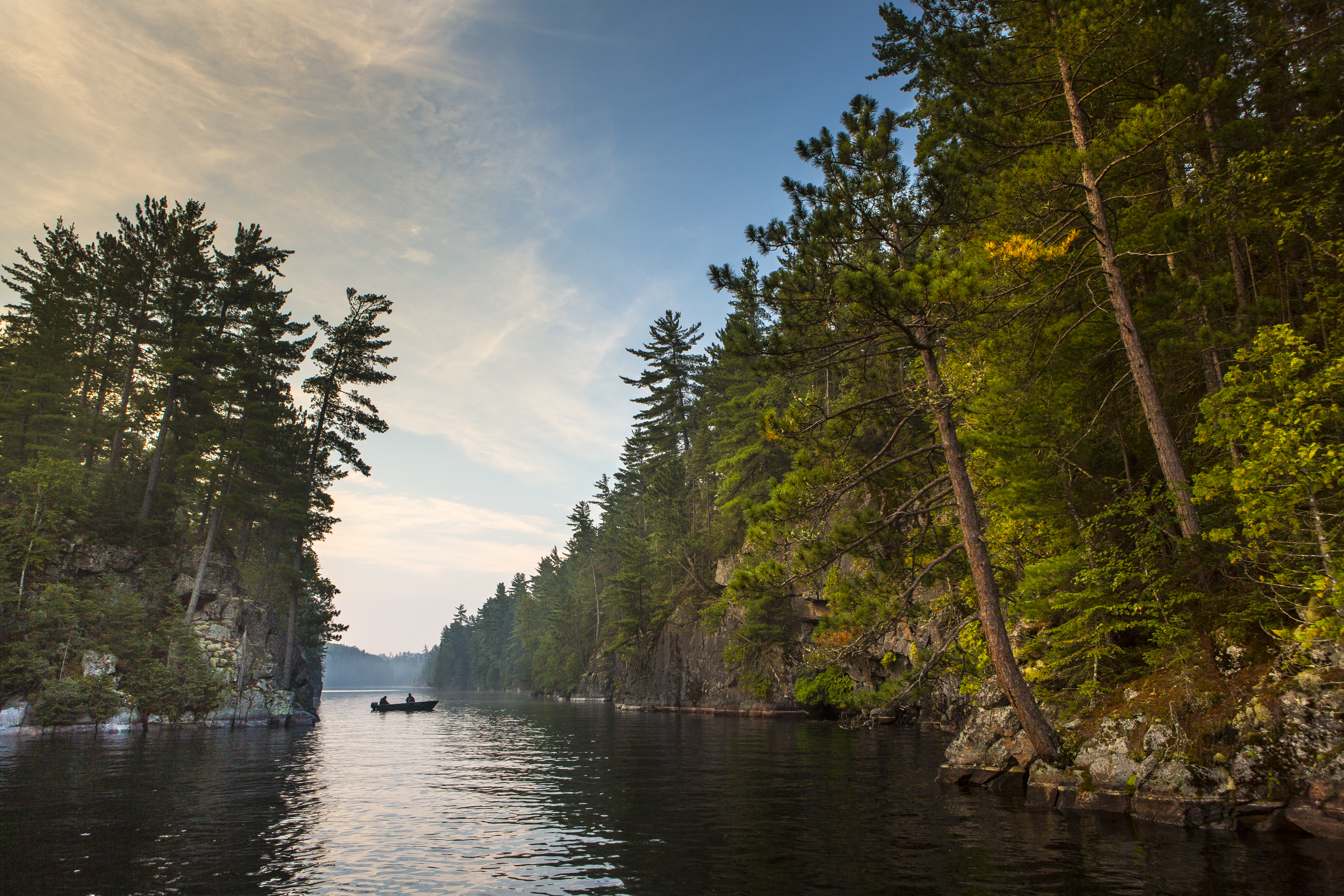 People boating in large Lake Kipawa in the Abitibi-Temiscamingue region of Quebec near North Bay, Ontario