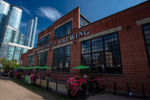 Steam Whistle Brewing signage on red brick building 