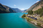 Rocky Mountaineer train winding around Seton Lake on the Rainforest to Gold Rush route