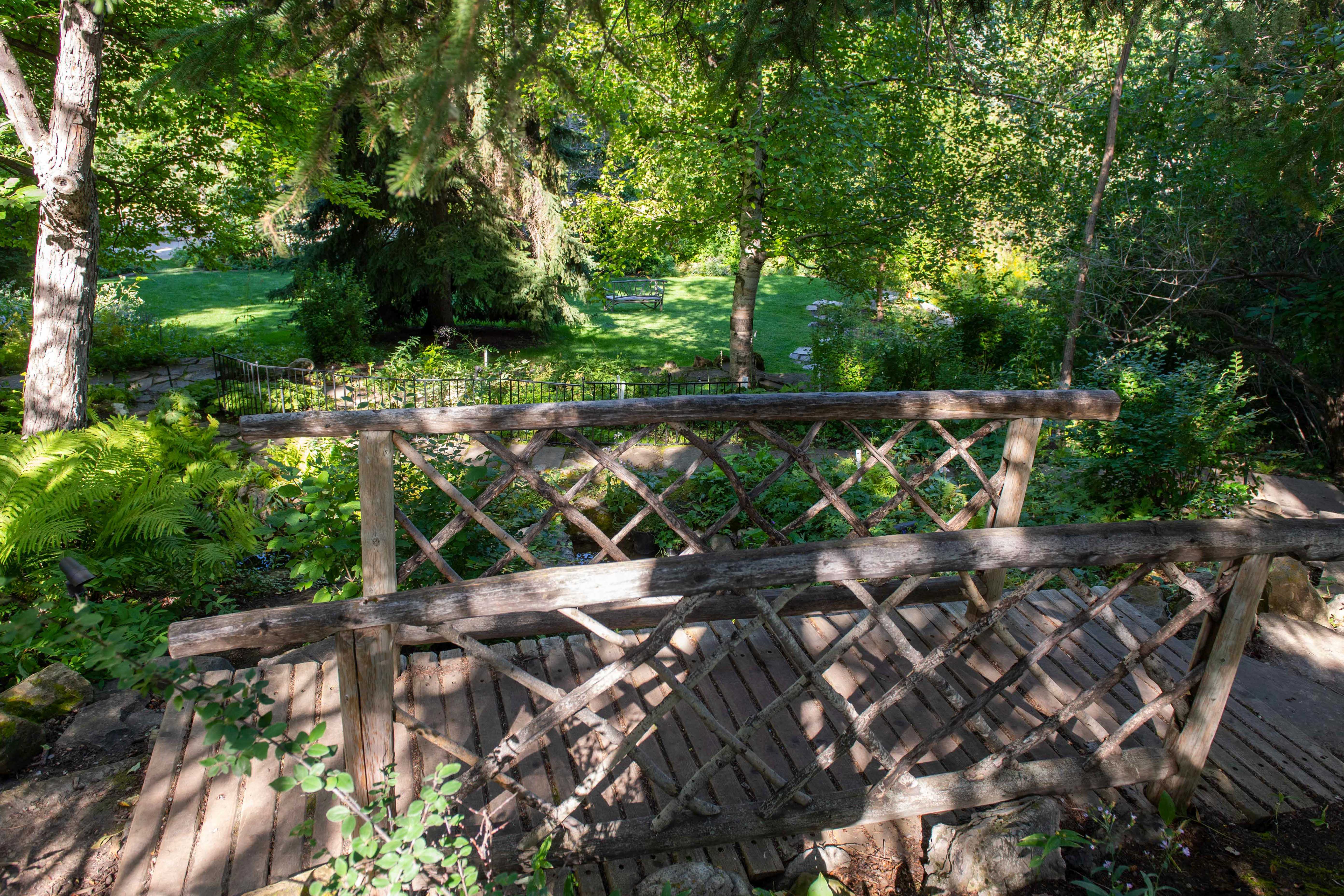 Small wooden bridge in garden