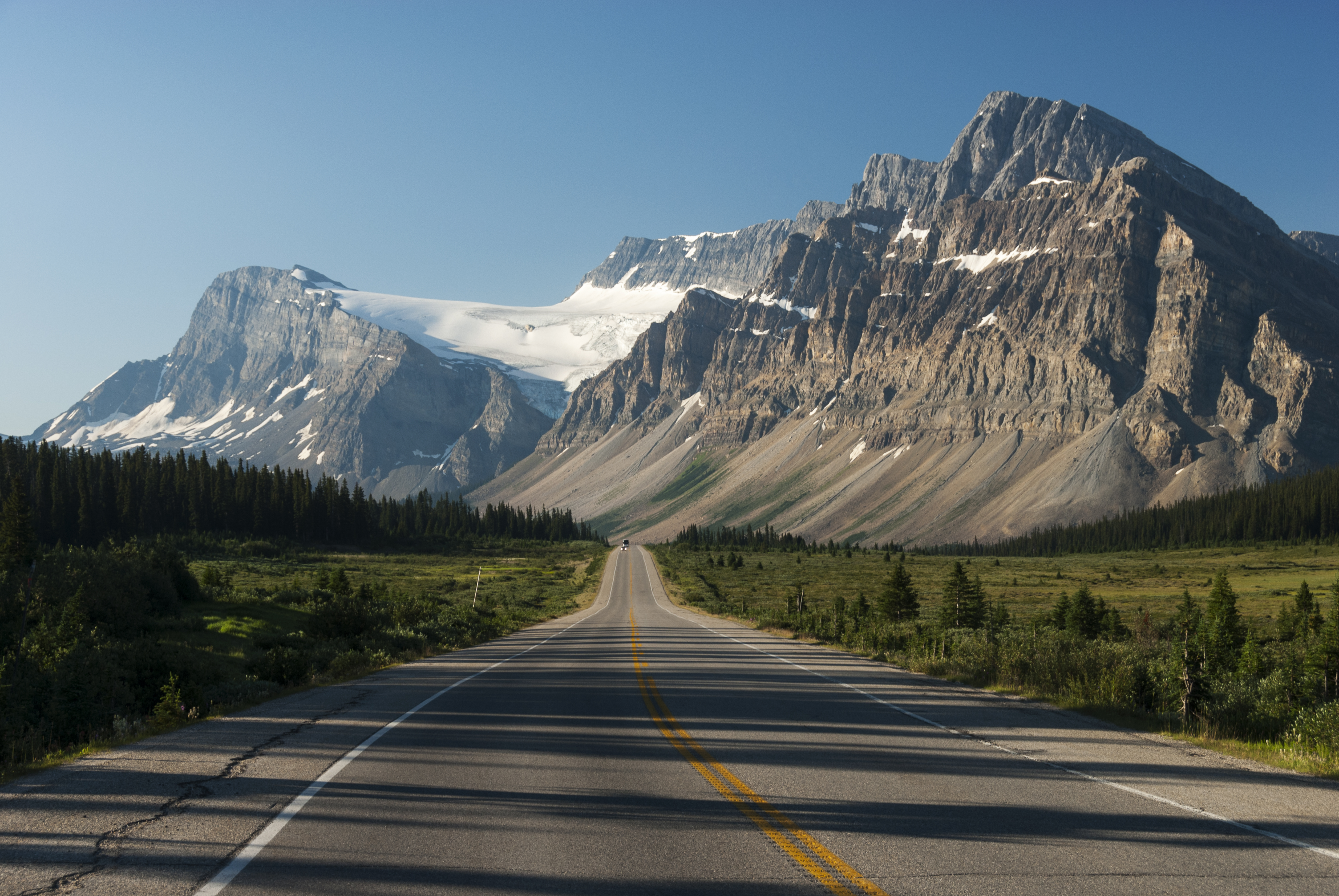 Icefields Parkway and Crowfoot Glacier with runoff feeding into the Bow River in Banff National Park, Alberta, Canada