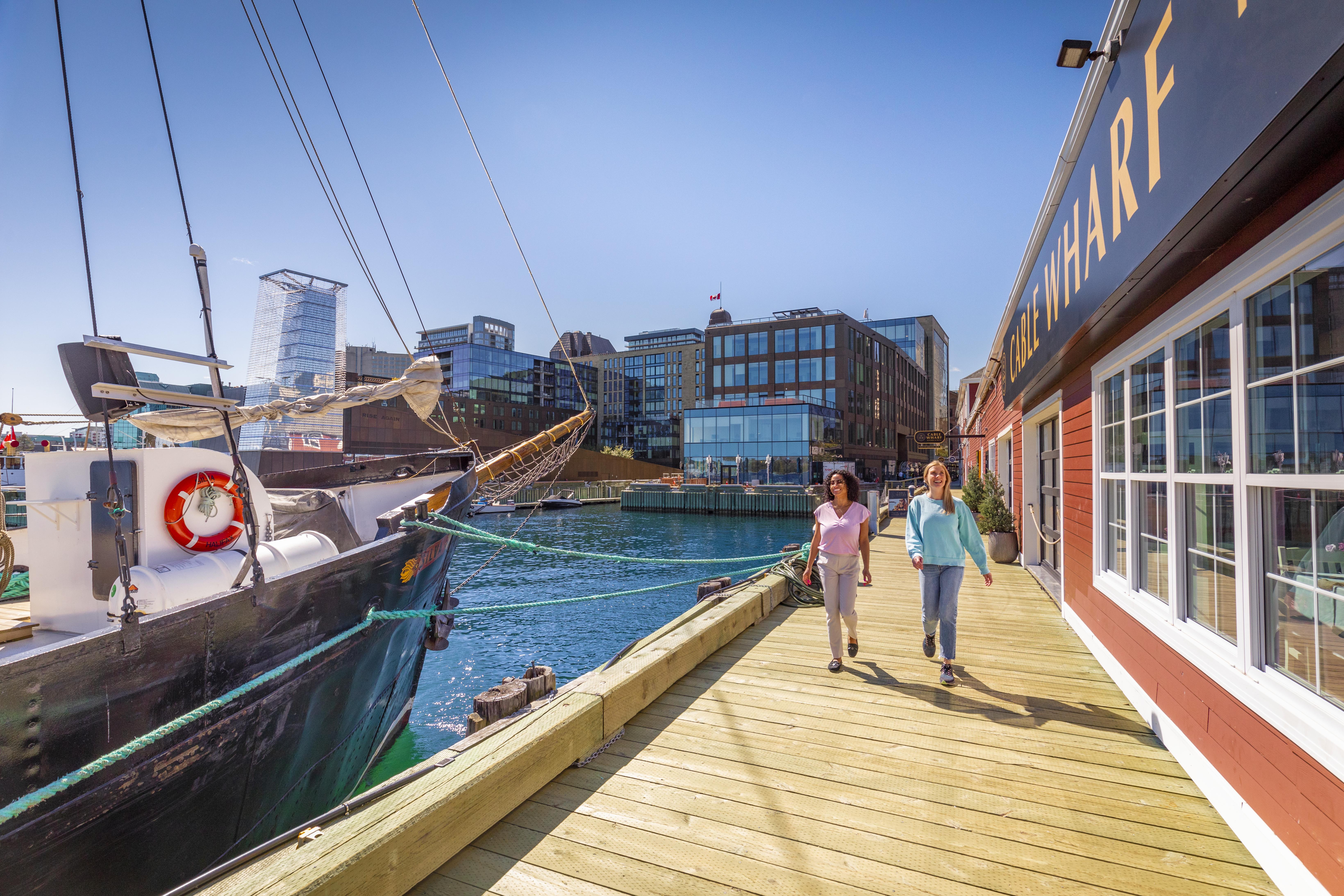 People walking on the Halifax Waterfront near Cable Wharf