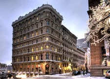 Historical 19th century building in Montreal with snow covered streets