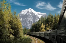 A view of a snowcapped mountain from the VIA train on the Toronto to Vancouver Route