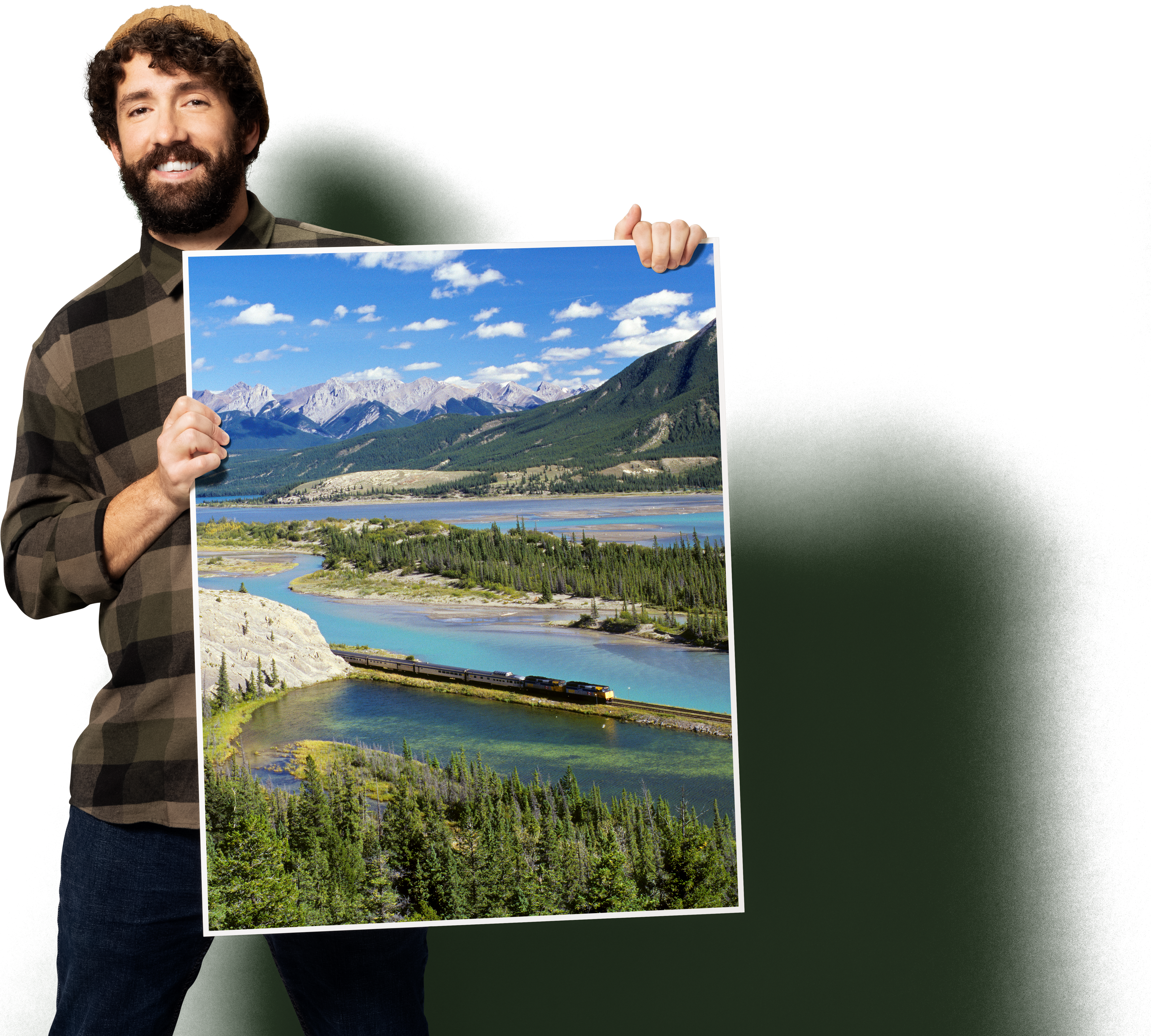 A person holding a large sign board with Canadian scenery on it