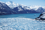 Cruise ship travels Glacier Bay with unobstructed views of mountains and glaciers during daytime
