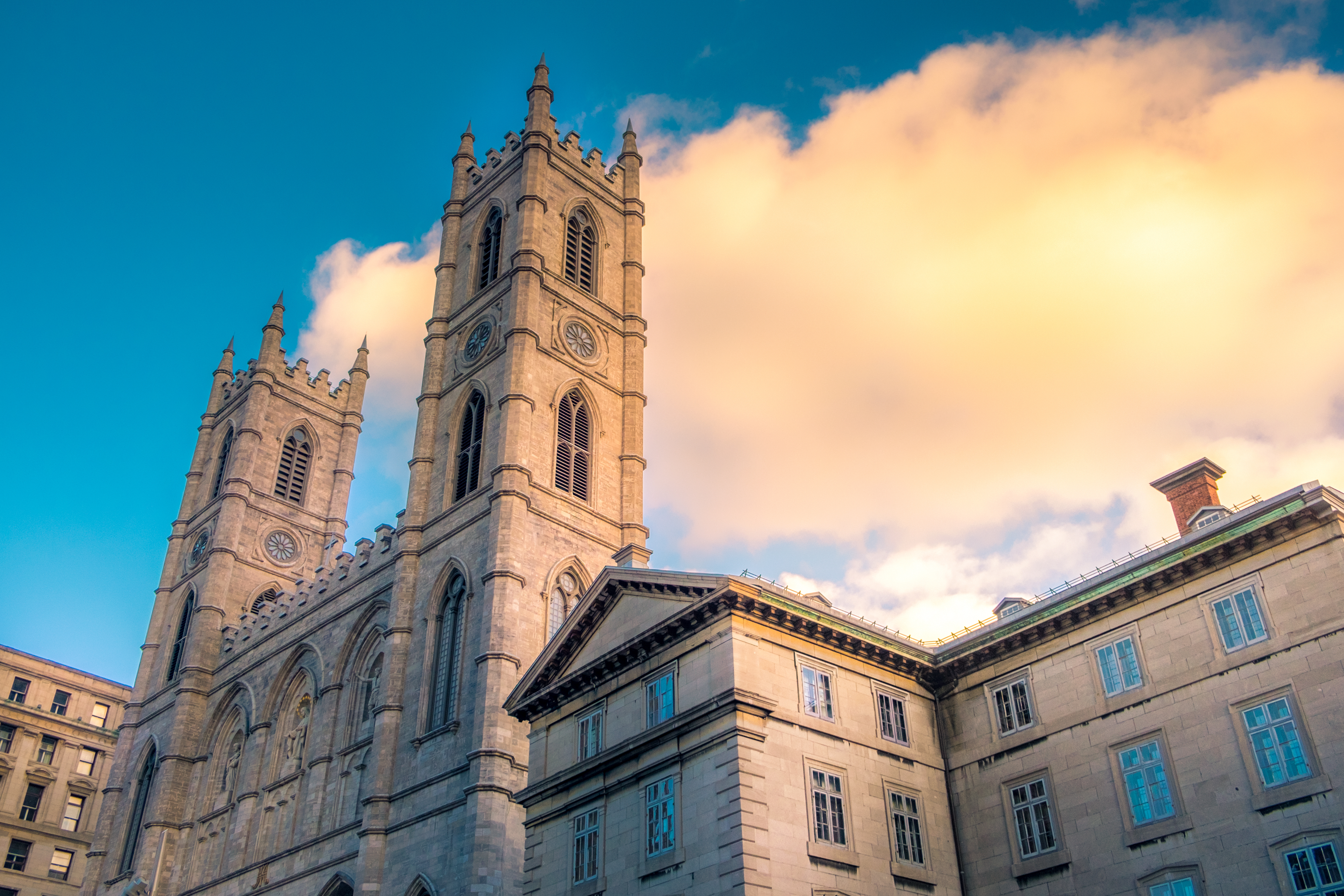 Towers of the Notre-Dame Basilica at sunset 