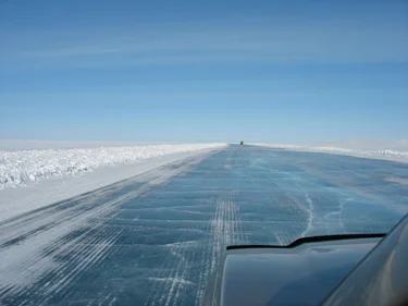 Driver view of truck looking ahead on the Ice Road near Yellowknife