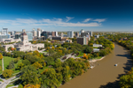 Aerial view of Winnipeg city, river and trees