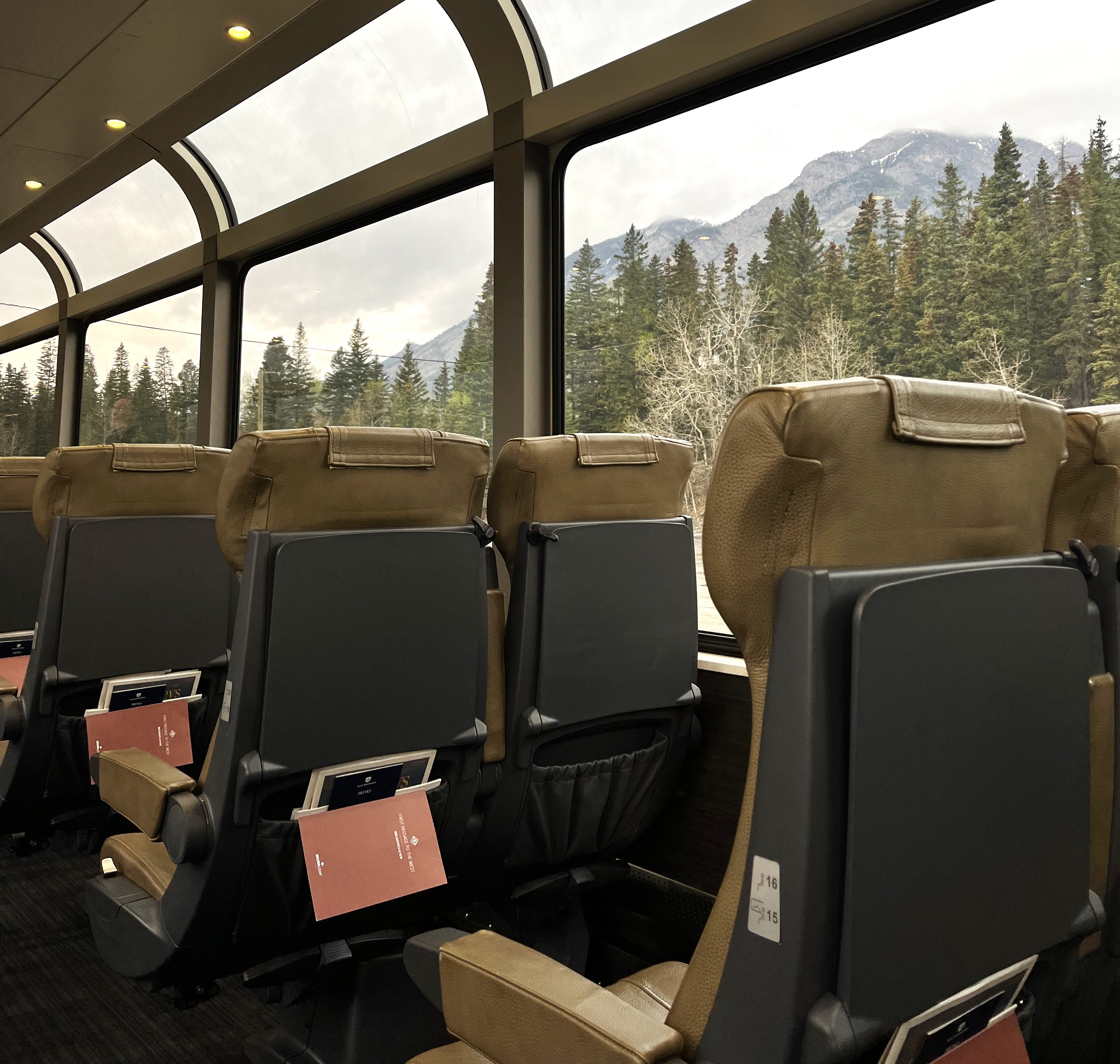 Seats next to large windows in SilverLeaf on Rocky Mountaineer