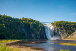 Clear blue sky above Montmorency Falls in Quebec 