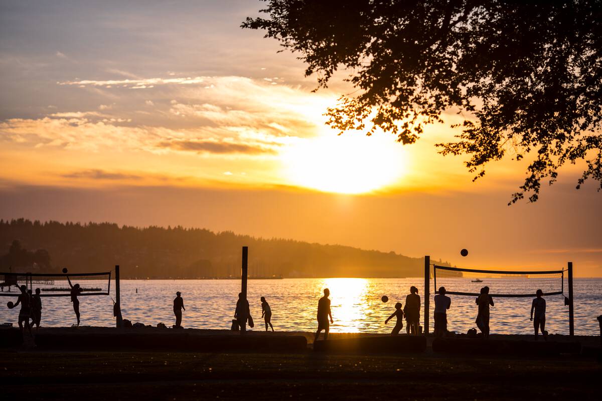 Volleyball on Kits Beach at sunset