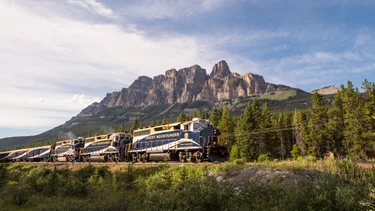 The Rocky Mountaineer train passing by the Canadian Rockies