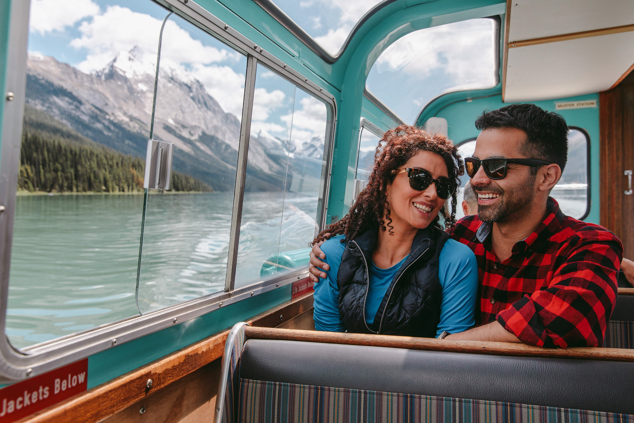 Close up of a couple on a Maligne Lake boat cruise 