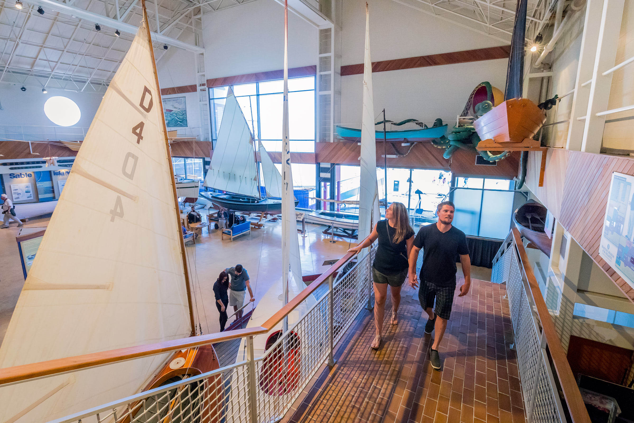 Couple exploring the indoor exhibits at the Maritime Museum of the Atlantic