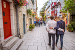 A couple walks down the streets of Old Quebec