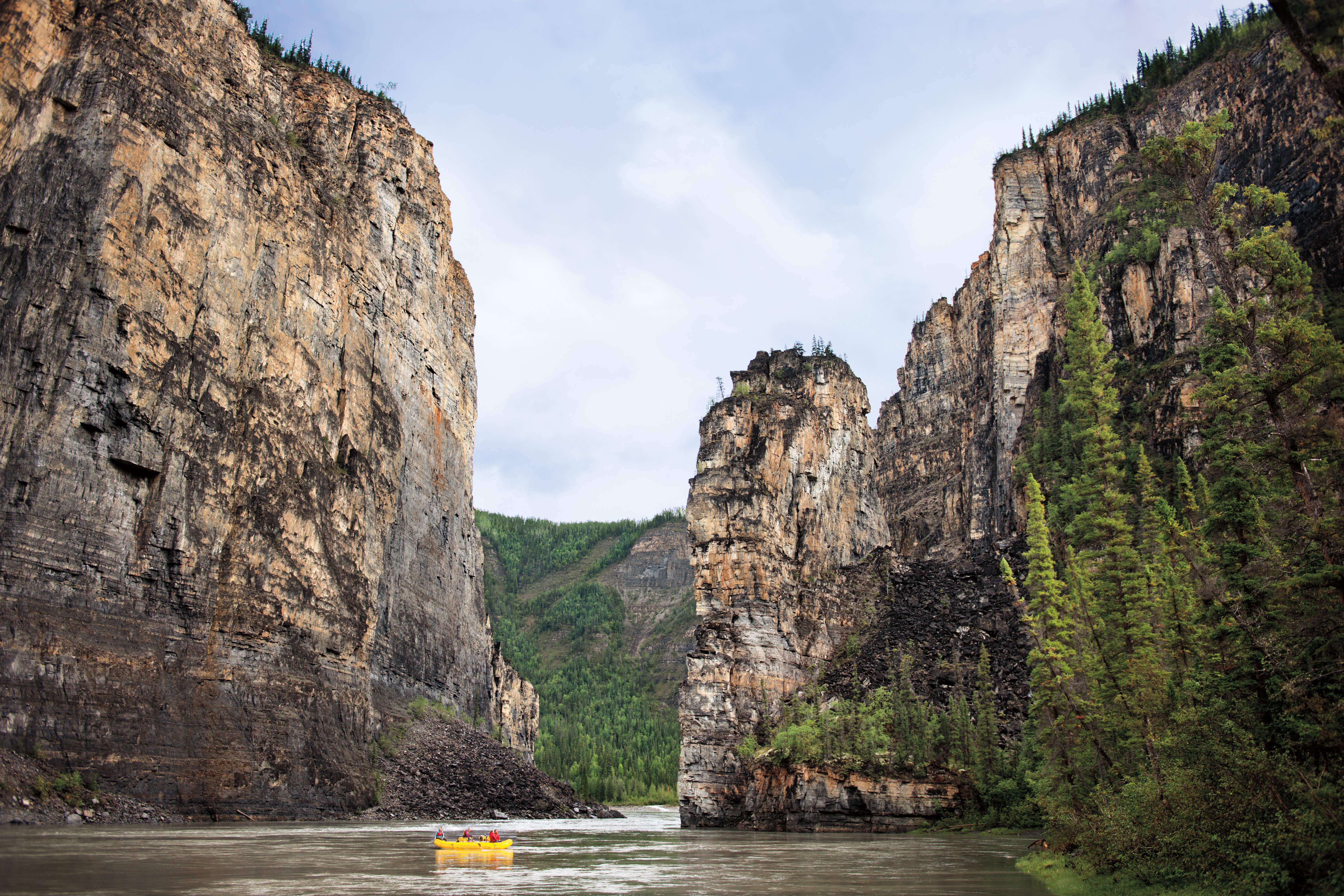 Rafting down glacier alley for Canadian River Expeditions/ Nahanni River Adventures