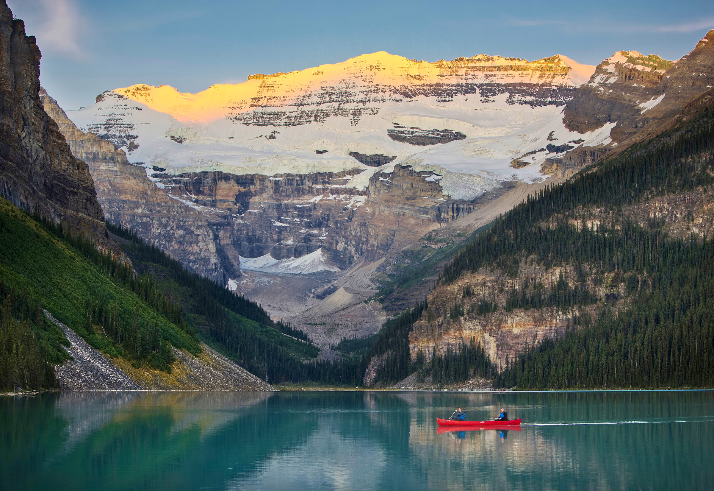 Couple canoeing on Lake Louise in Banff National Park