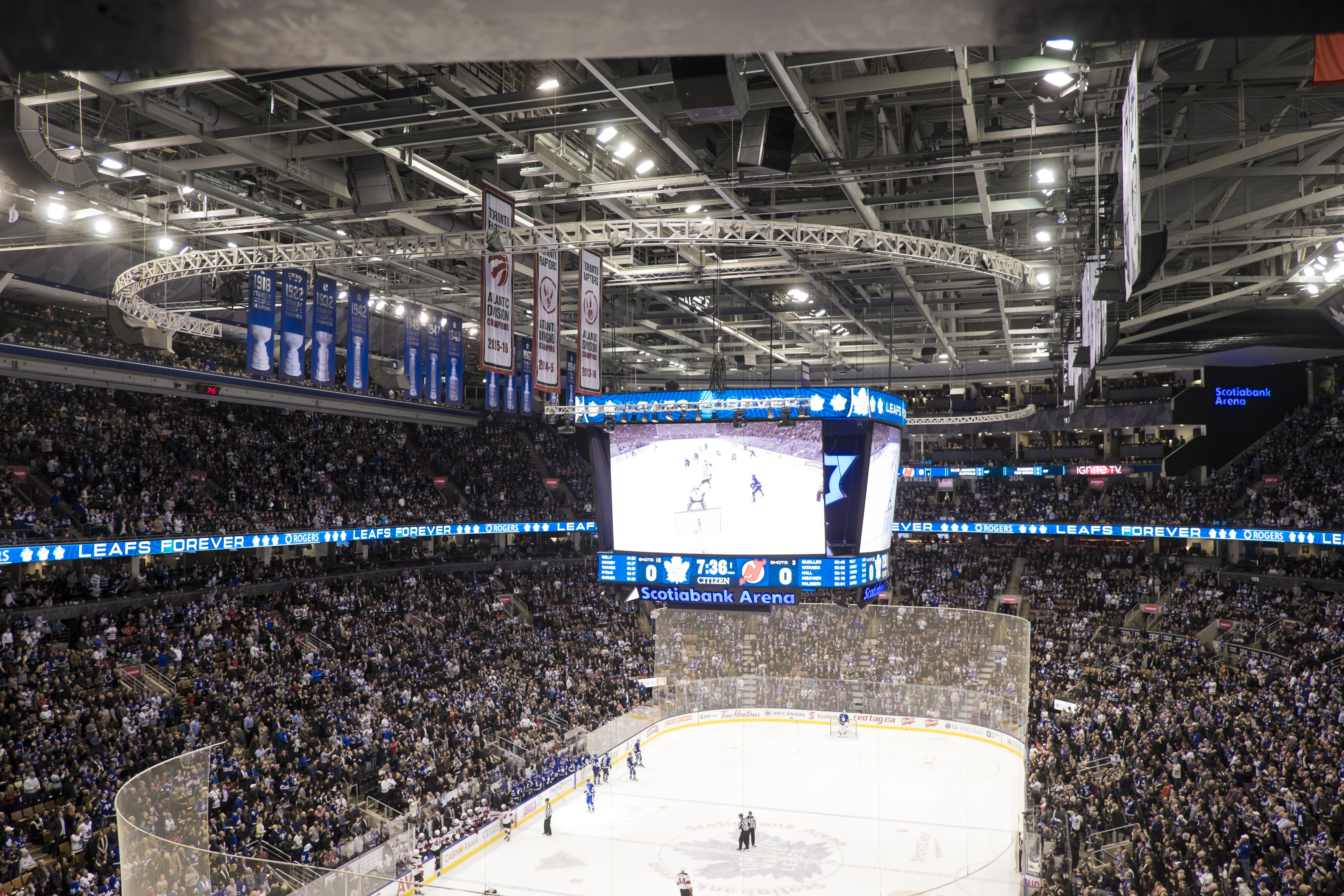People in an arena watching an ice hockey game in Toronto