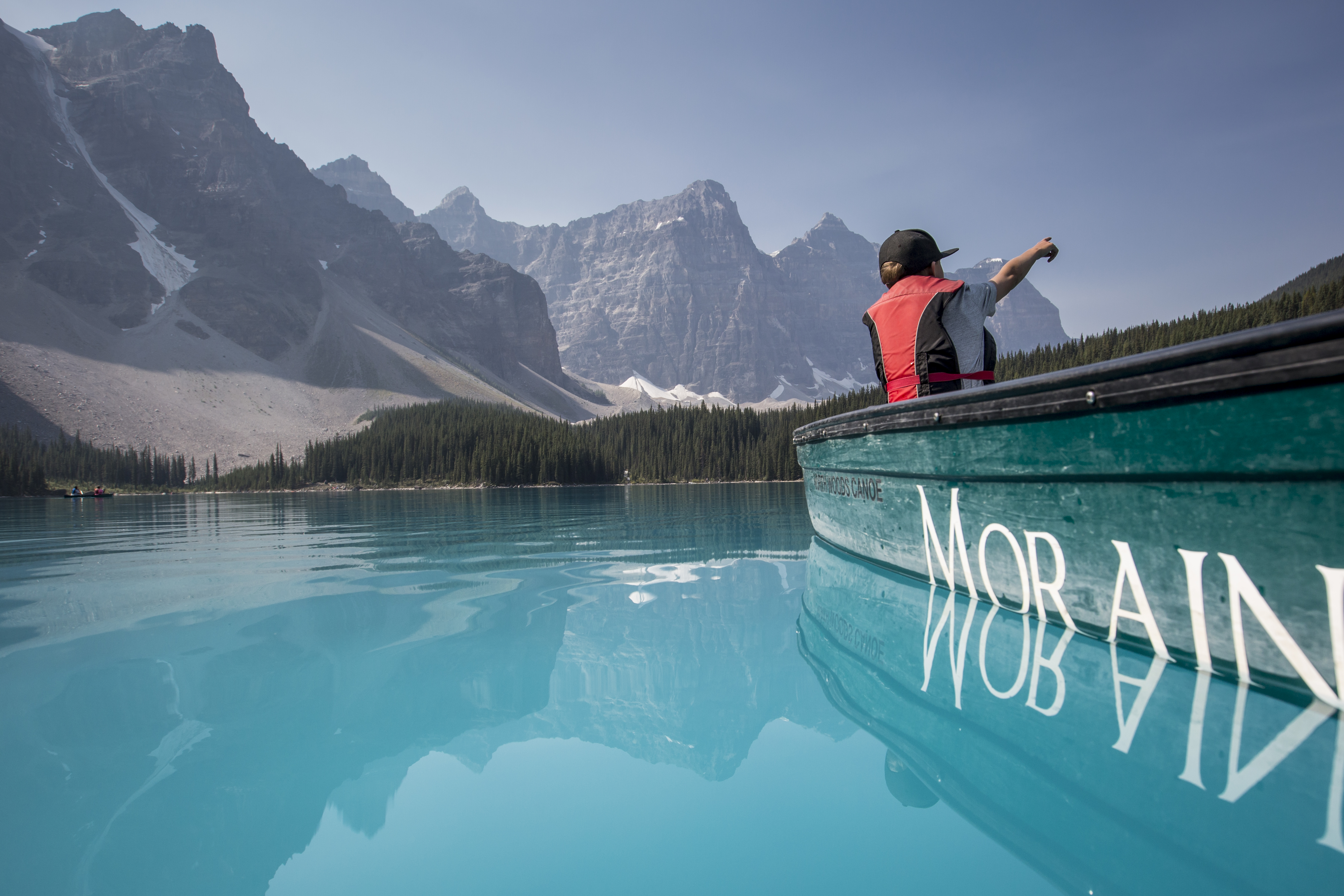 Canoeing in Moraine Lake in Banff, Alberta.