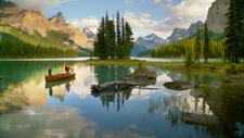 Father and son in canoe fishing on Maligne Lake