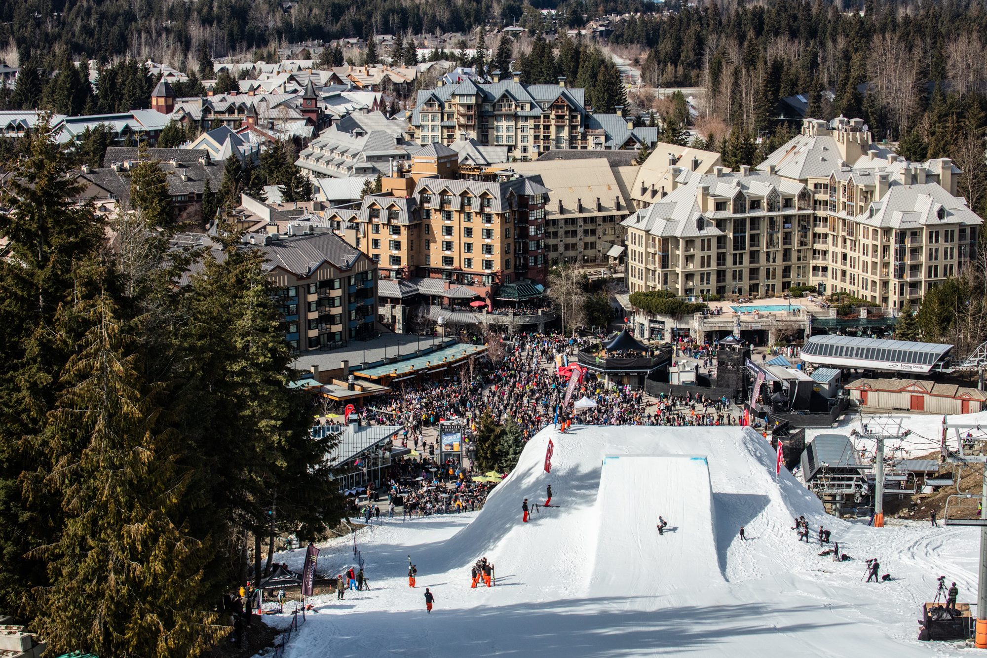 Crowd in Whistler village watching snowboarders compete in the World Ski and Snowboard Festival