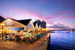 Pickford and Black restaurant with a patio on the waterfront in Halifax at sunset