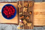 Snacking raspberries and local pastries on a canoe paddle at Pyramid Lake