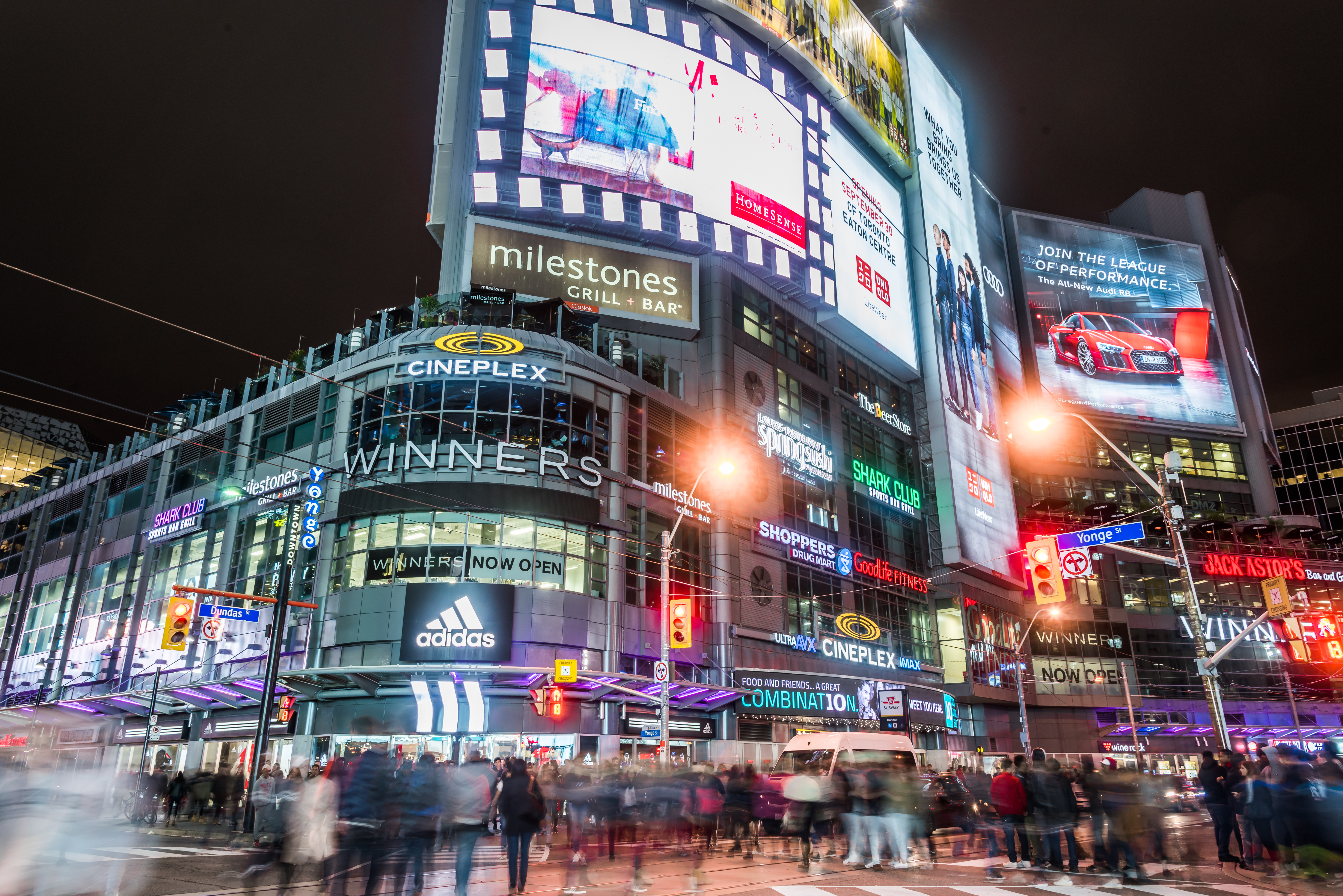 Bright lights, billboards and signs in Yonge-Dundas Square at night
