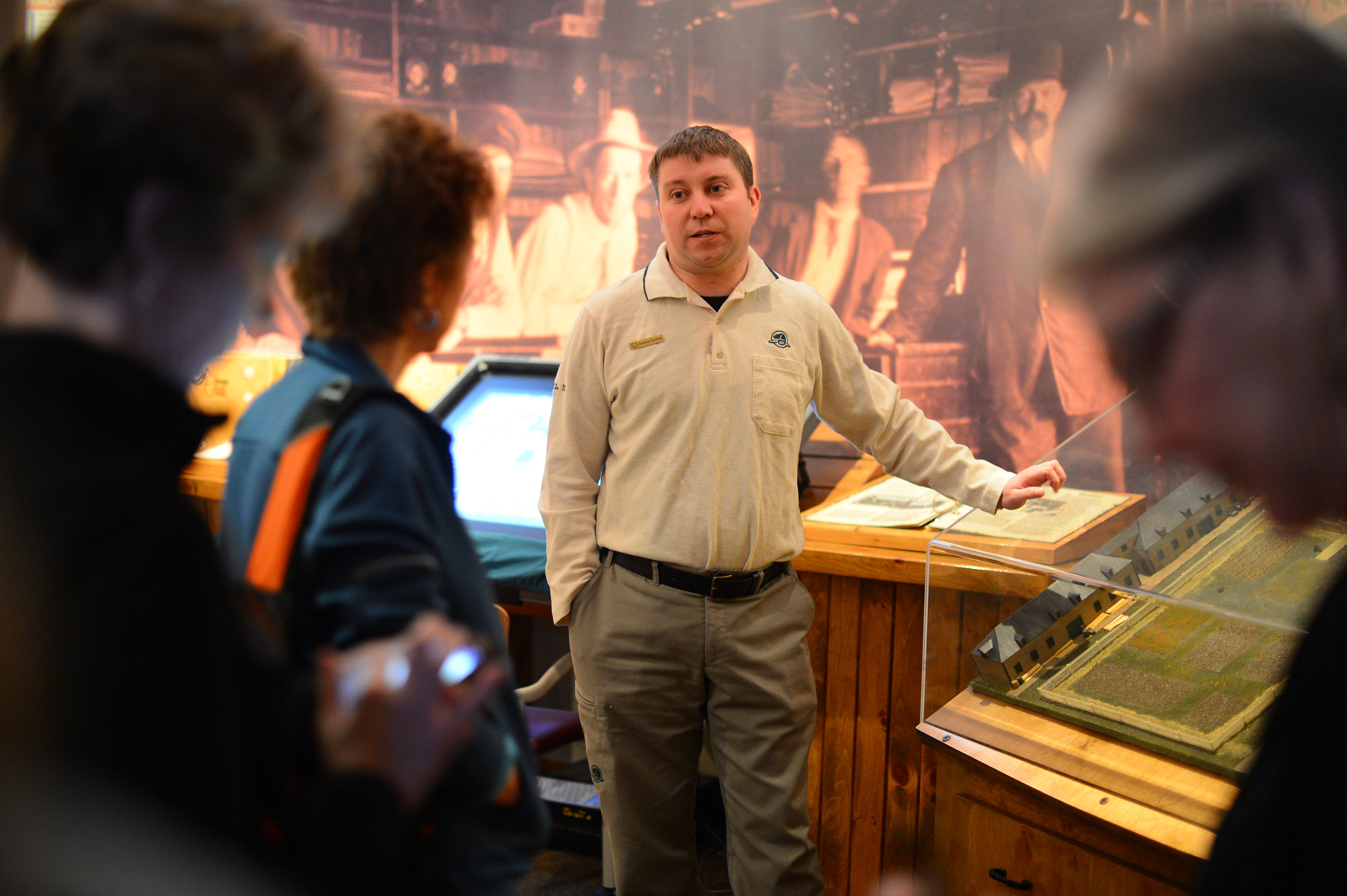 Parks Canada Representative speaking to a small group in a museum
