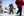 A couple of people are snowshoeing in the snow