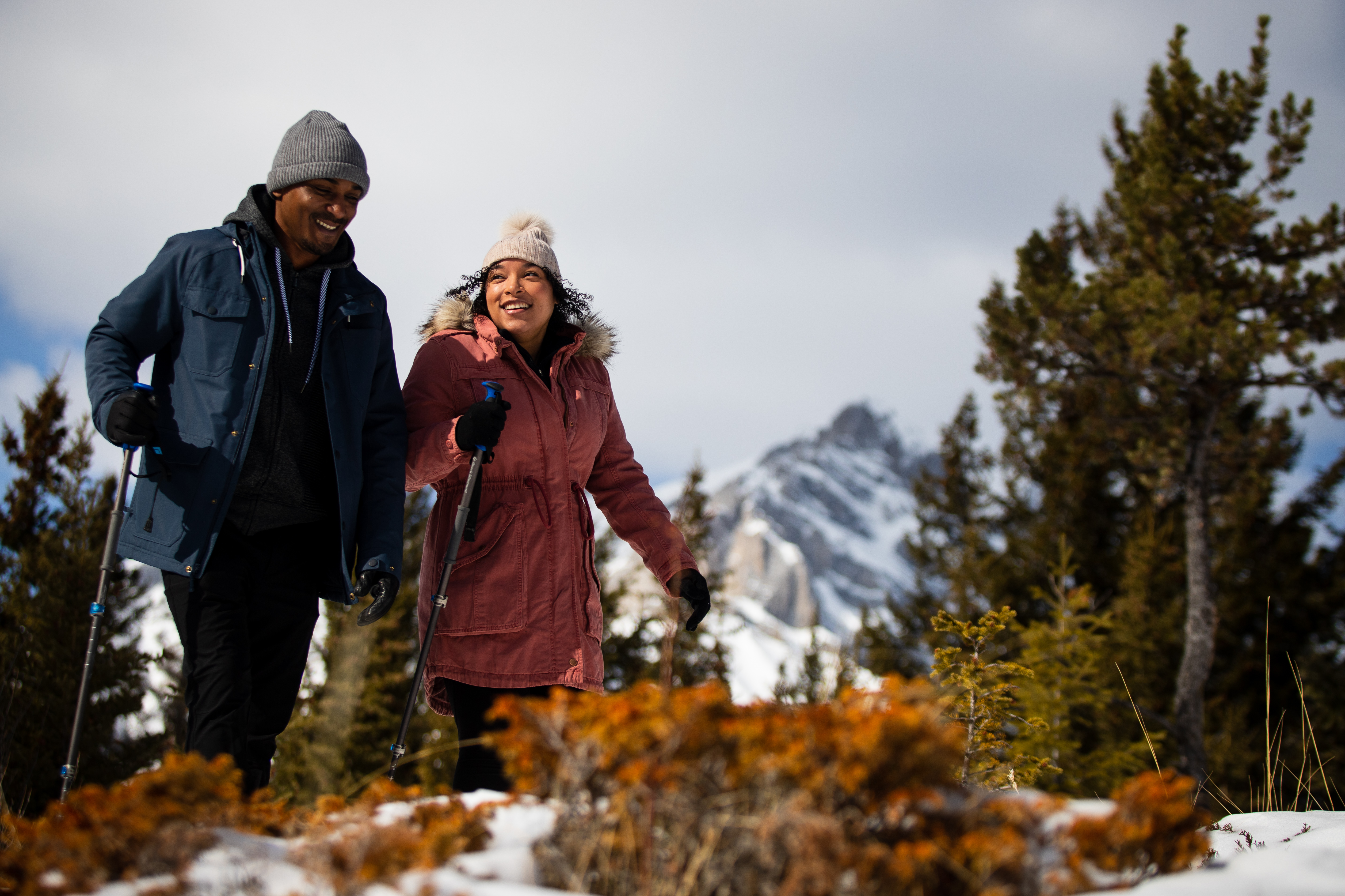 Couple hiking hoodoo trail in winter