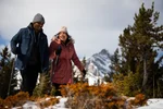 Couple hiking hoodoo trail in winter