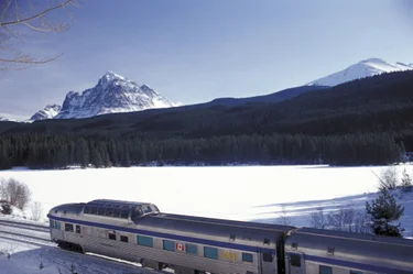 VIA Rail train traveling in Canada in winter