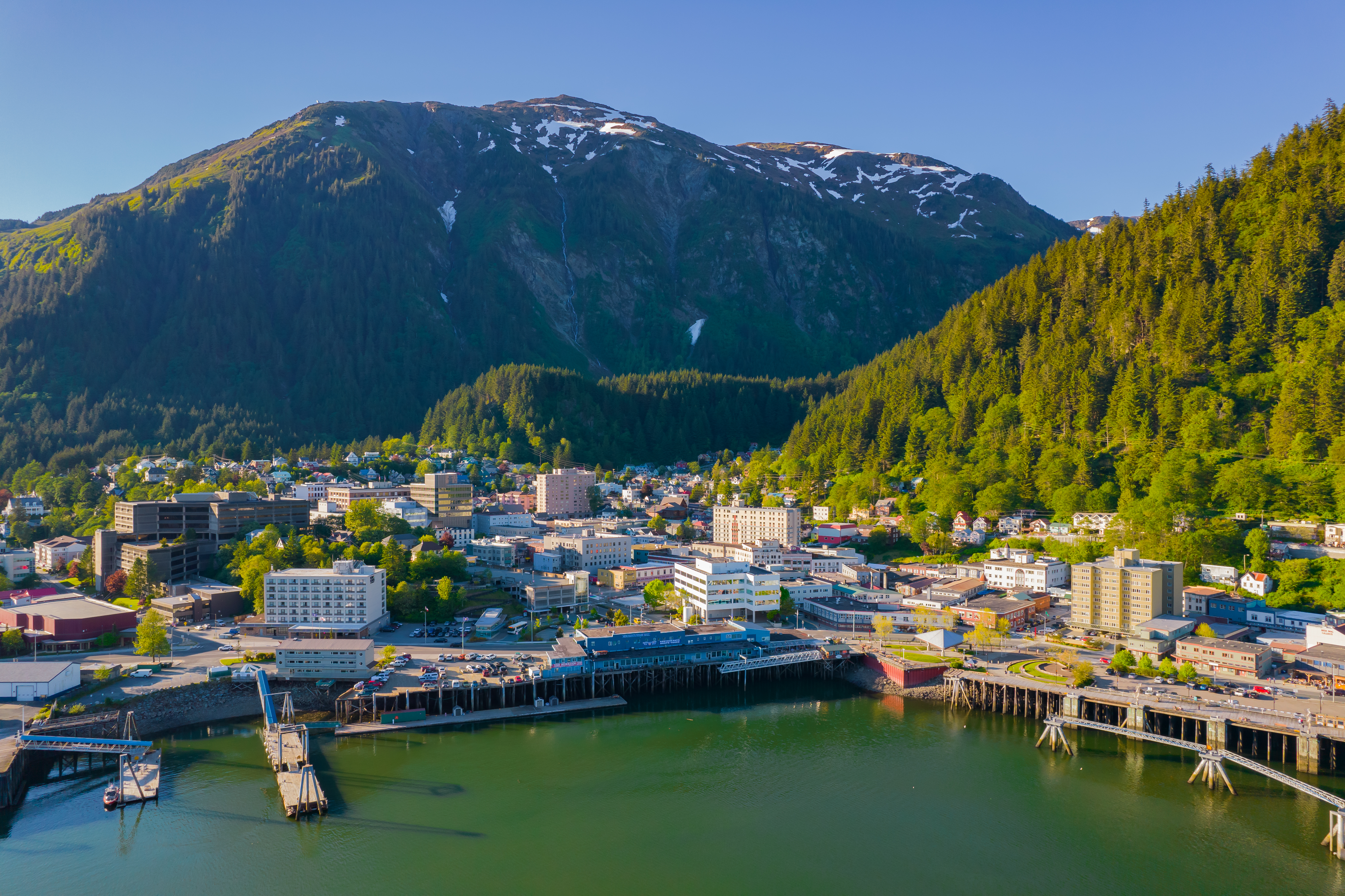 Juneau city next to the water with mountain behind
