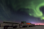 The Tundra Buggy Lodge in Churchill under swirling Northern Lights 