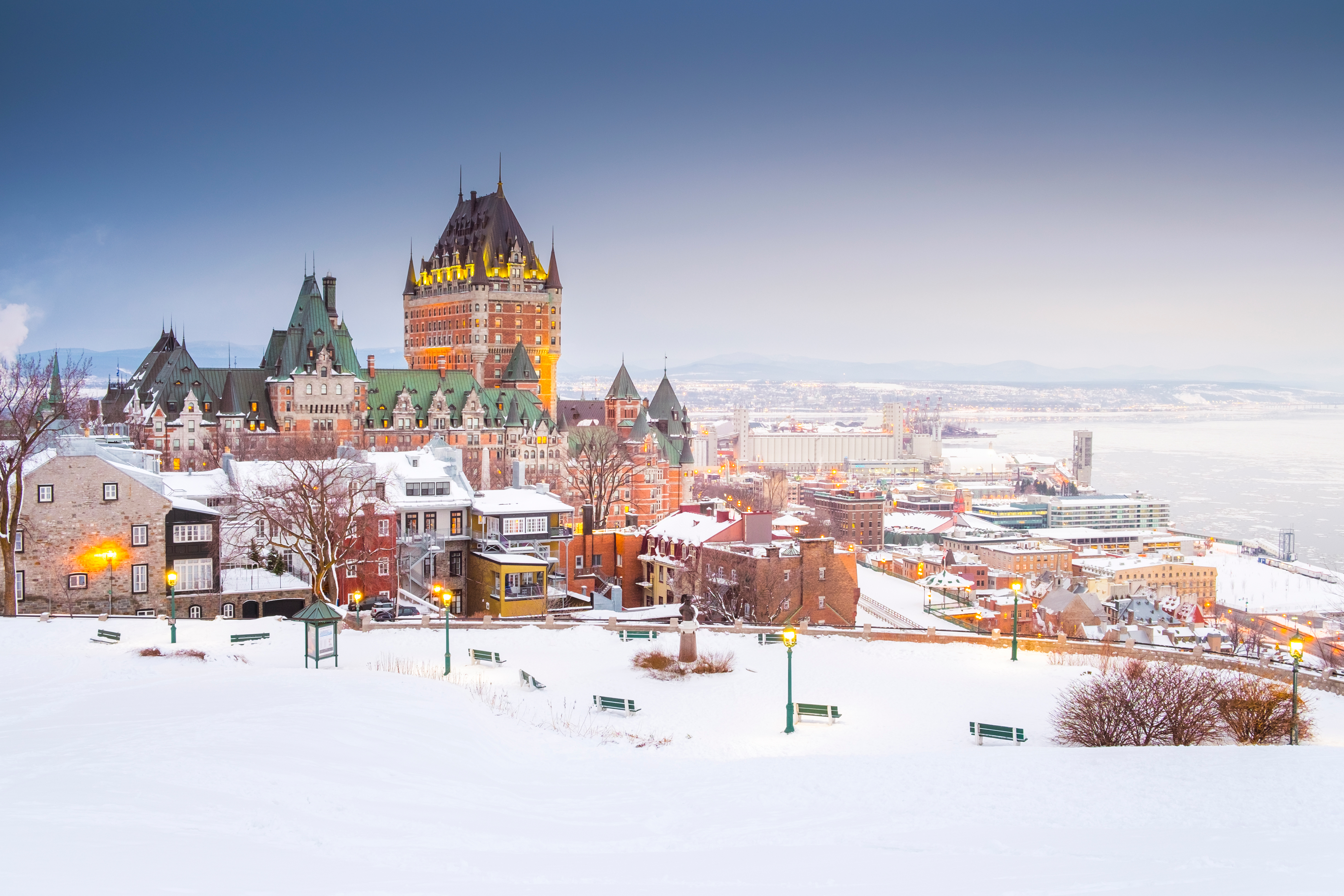 View of Fairmont le Chateau Frontenac, Quebec City and St. Lawrence river on a snowy day