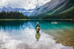 Fly fishing at Marvel Lake in Banff National Park in the Canadian Rockies