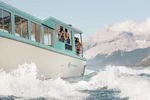Waves crash against the cruise boat on Lake Minnewanka.
