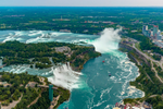 An aerial view above Niagara Falls including the American Falls and Horseshoe Falls