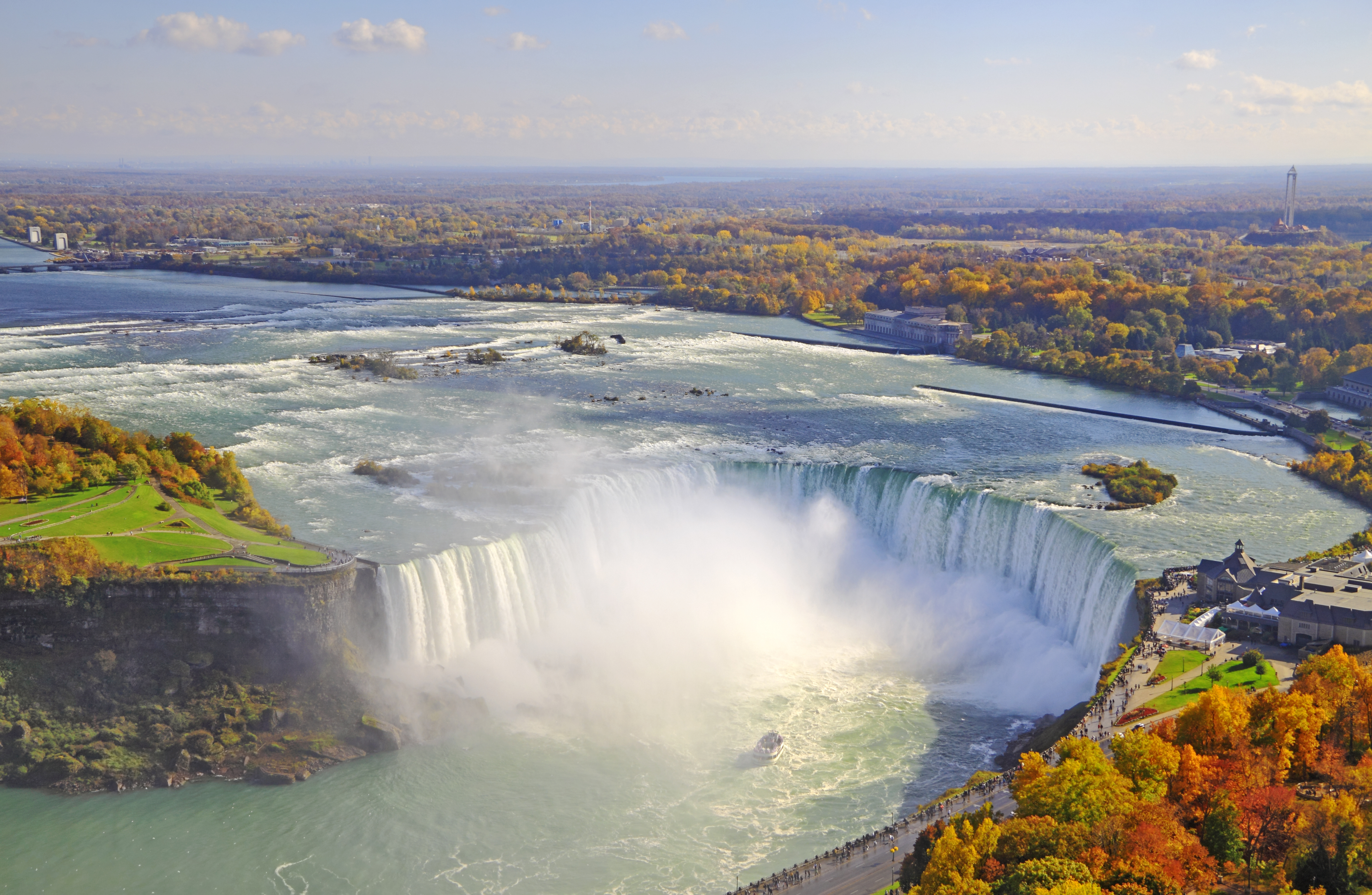 Mist rises above Horseshoe Falls' basin in Niagara Falls, Canada