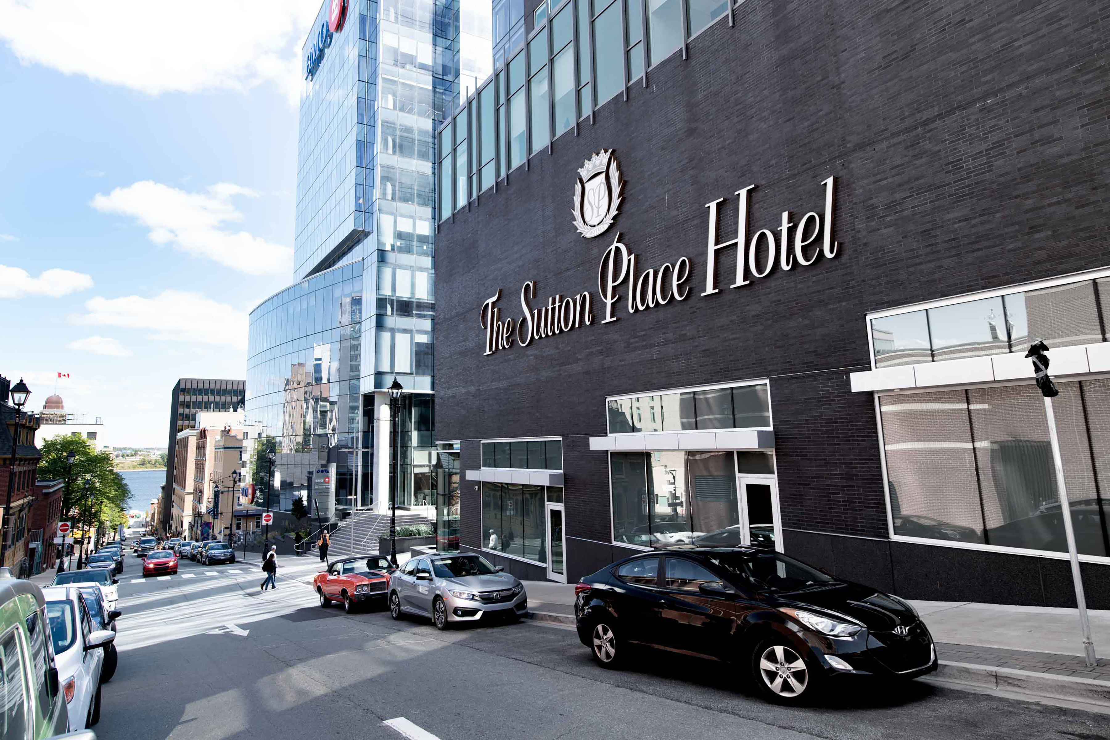 Exterior view of the Sutton Place Hotel Halifax on a sunny day